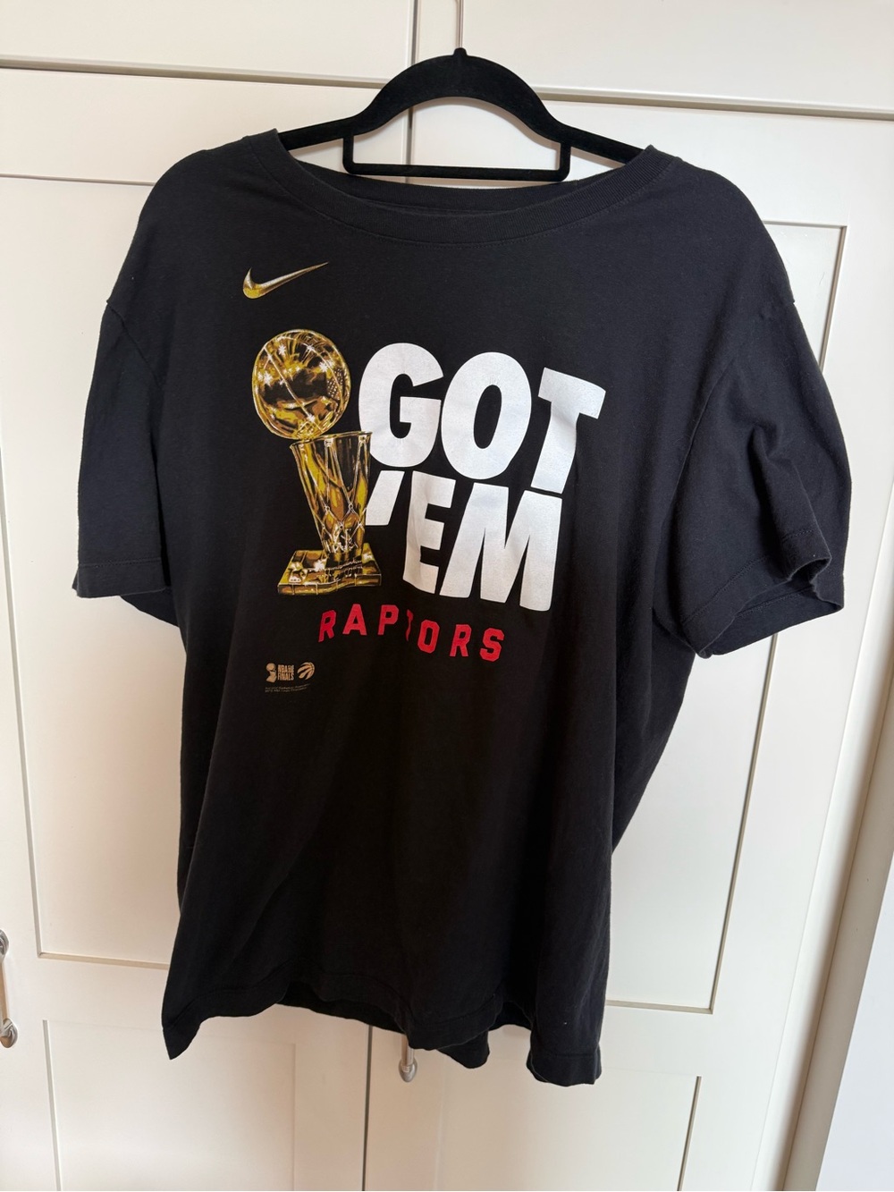 Nike Black Graphic 'Got 'Em' Raptors Tee with Gold Trophy Accent